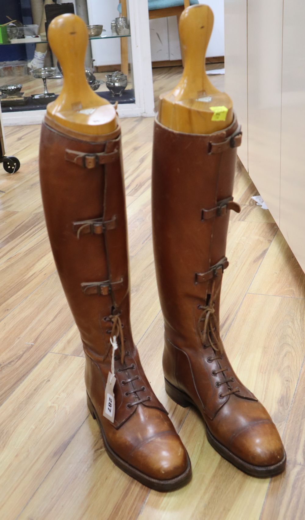 A pair of gentlemans leather riding boots, with shoe-trees, by W.Taylor, Great Portland Street, boot height 48cm